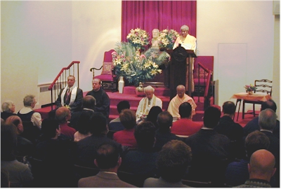 Swami Adiswarananda welcoming the guest speakers.